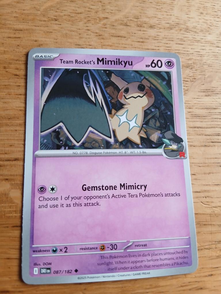 Team Rocket's Mimikyu 087/182, Ophalen of Verzenden, Zo goed als nieuw, Losse kaart