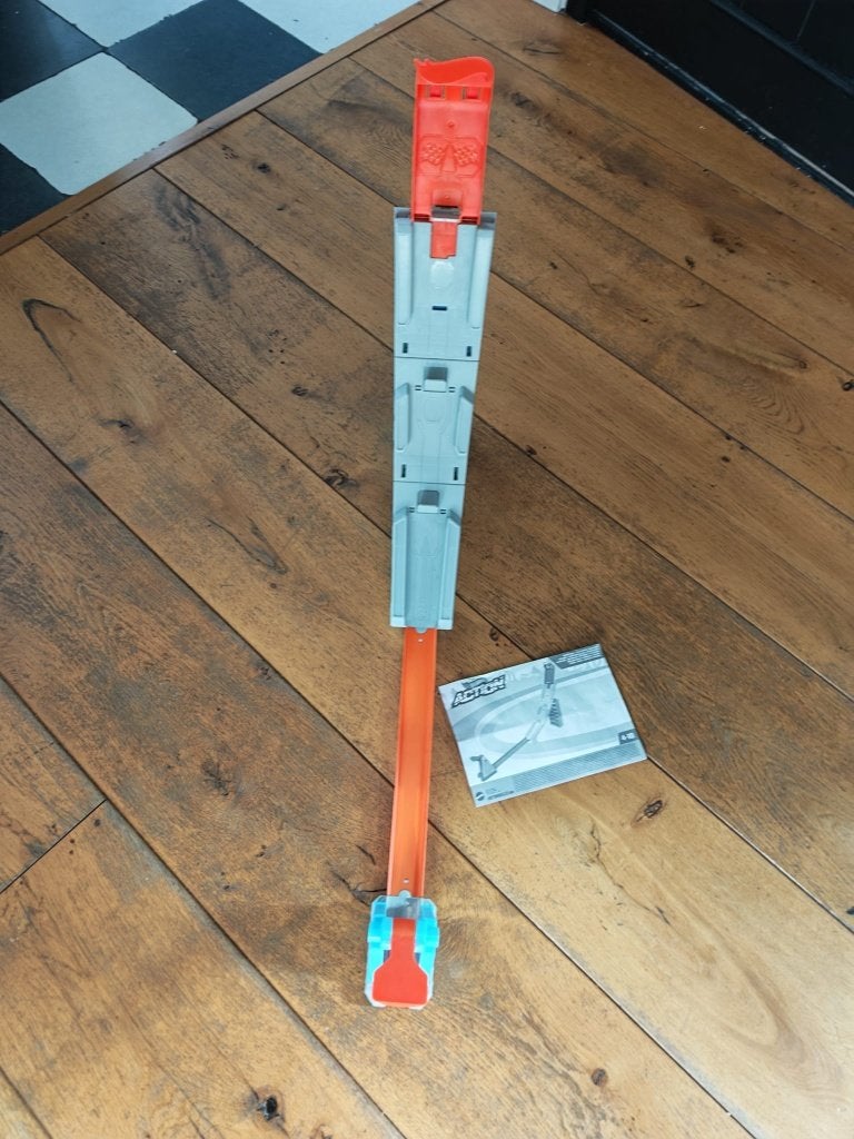 Hot Wheels Action racebaan – met handleiding en auto, Racebaan, Zelf te bouwen, Ophalen of Verzenden, Zo goed als nieuw