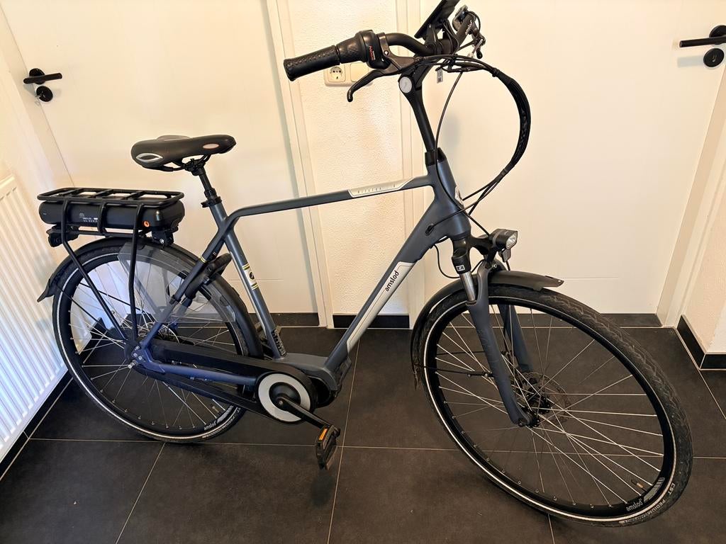 Nette Amslod elektrische fiets 600watt middenmotor weinig km, Fietsen en Brommers, Fietsen | Heren | Herenfietsen, Ophalen of Verzenden
