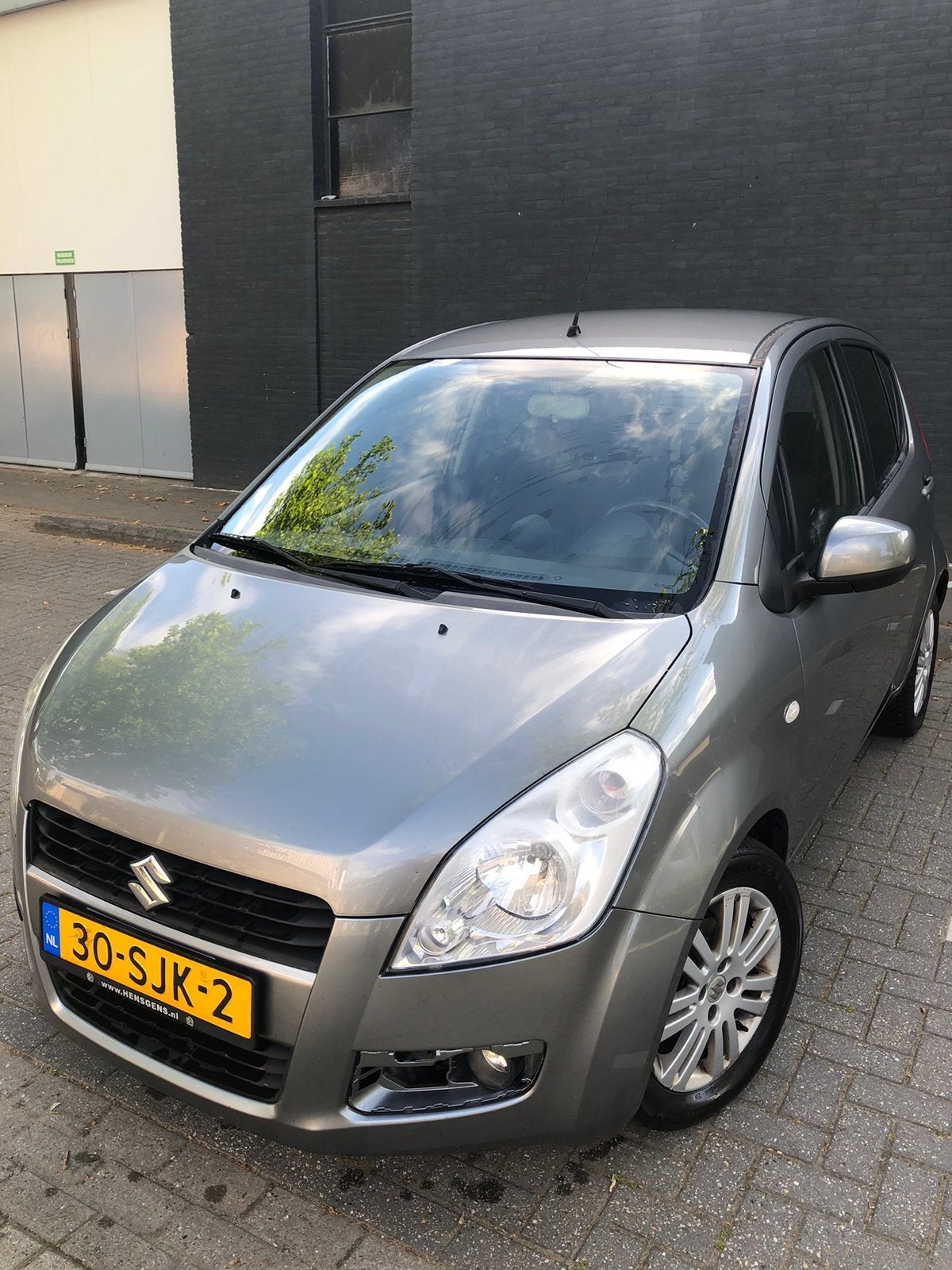 Suzuki Splash 1.2 AUT 2011 Grijs, Auto's, Euro 5, 40 €/maand, 4 cilinders, Origineel Nederlands