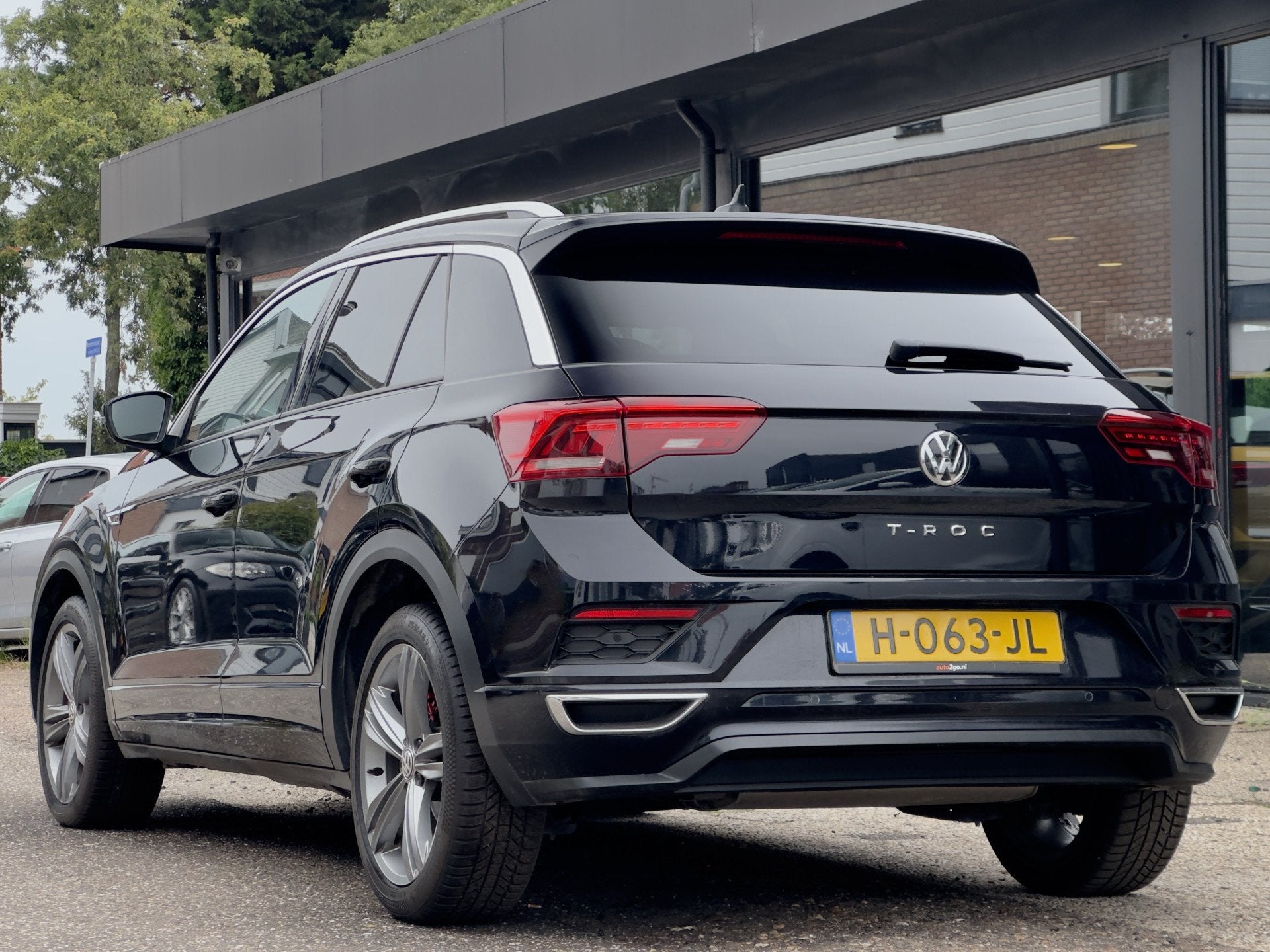 Volkswagen T-Roc 1.5 TSI AUT7 R-LINE SPORT NAVI DIGIDASH APP, Auto's, Volkswagen, Stof, 4 cilinders, 150 pk, Zwart