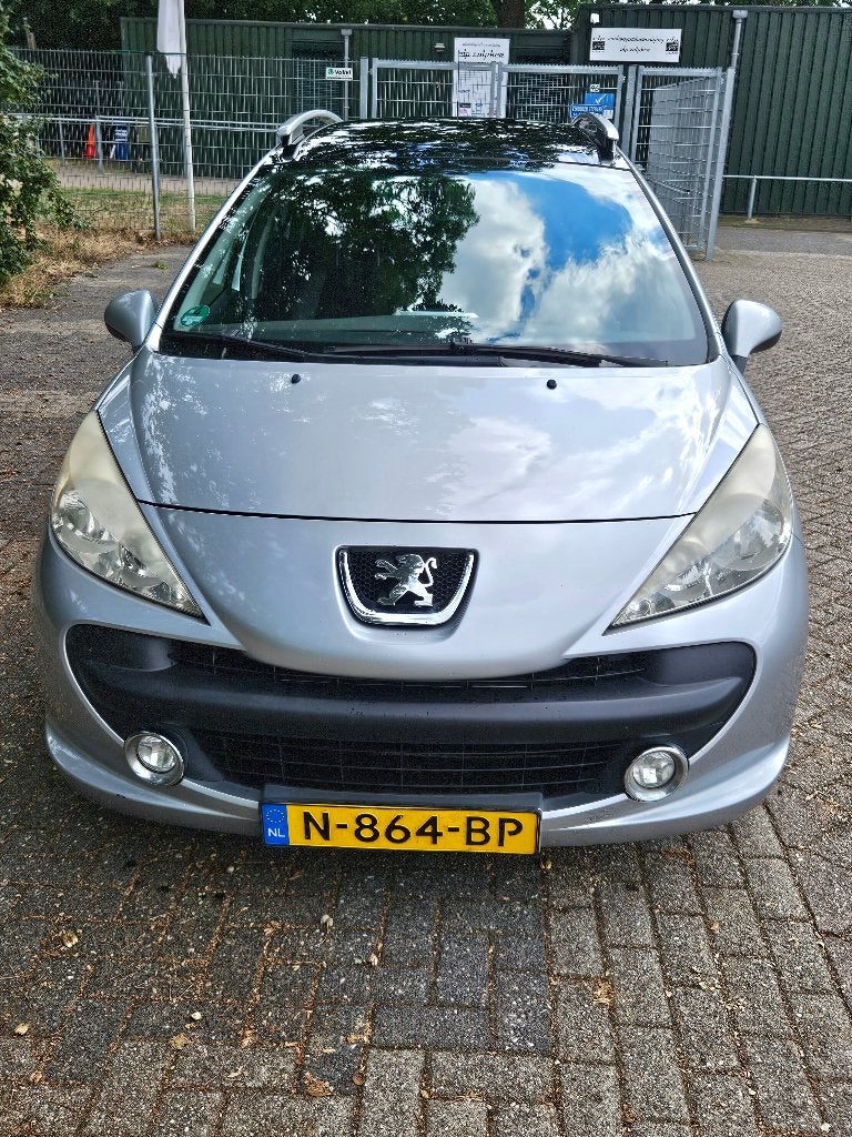 Peugeot 207 1.4 95pk 2009 Grijs, Voorwielaandrijving, Stof, Panoramadak, Stationwagon