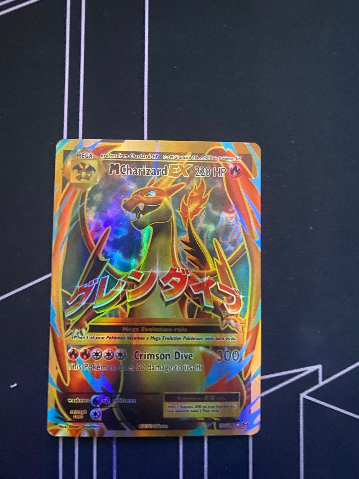 Mooie en zeer speciale Pokémon M Charizard EX 220 HP kaart, Ophalen of Verzenden, Zo goed als nieuw, Losse kaart, Foil