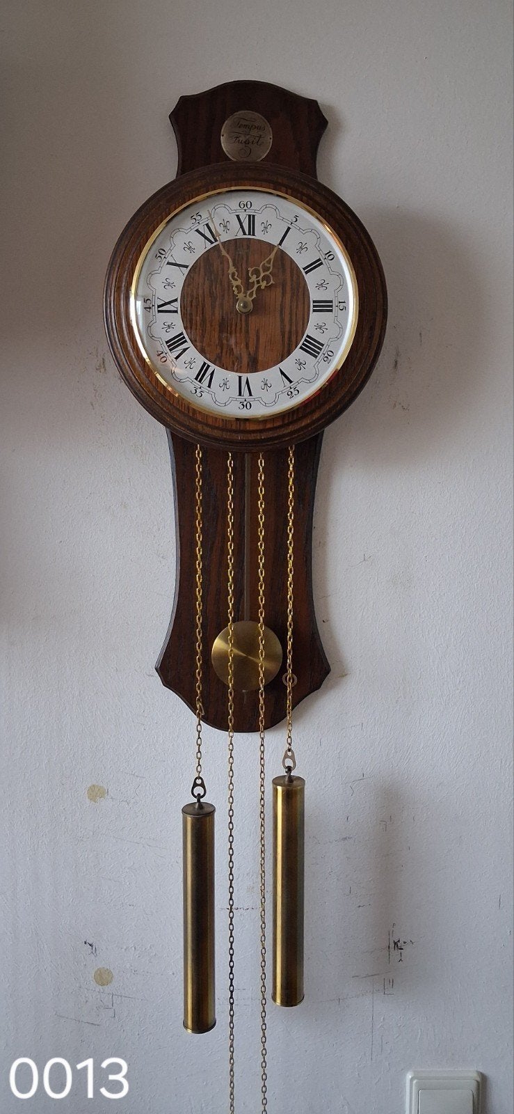 Wandklok met slinger en gewichten, Ophalen
