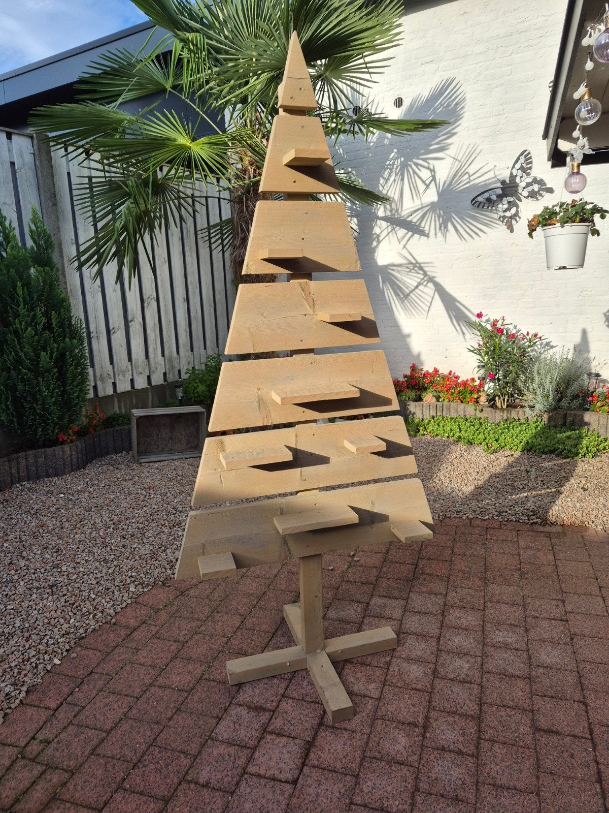 steigerhouten kerstboom, Ophalen