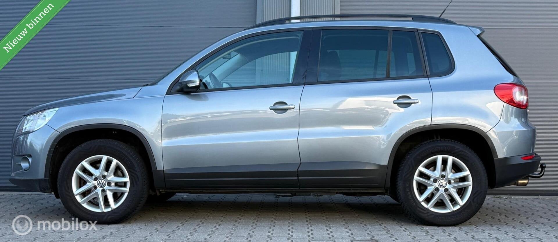 Volkswagen Tiguan 1.4 TSI Trend&Fun 4Motion Trekhaak/Clima/E, Auto's, Gebruikt, 4 cilinders, Origineel Nederlands, Bedrijf