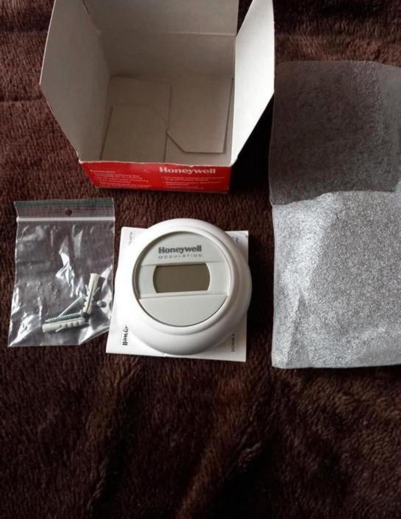 nieuw in doos honeywell round modulation kamerthermostaat, Ophalen of Verzenden, Nieuw