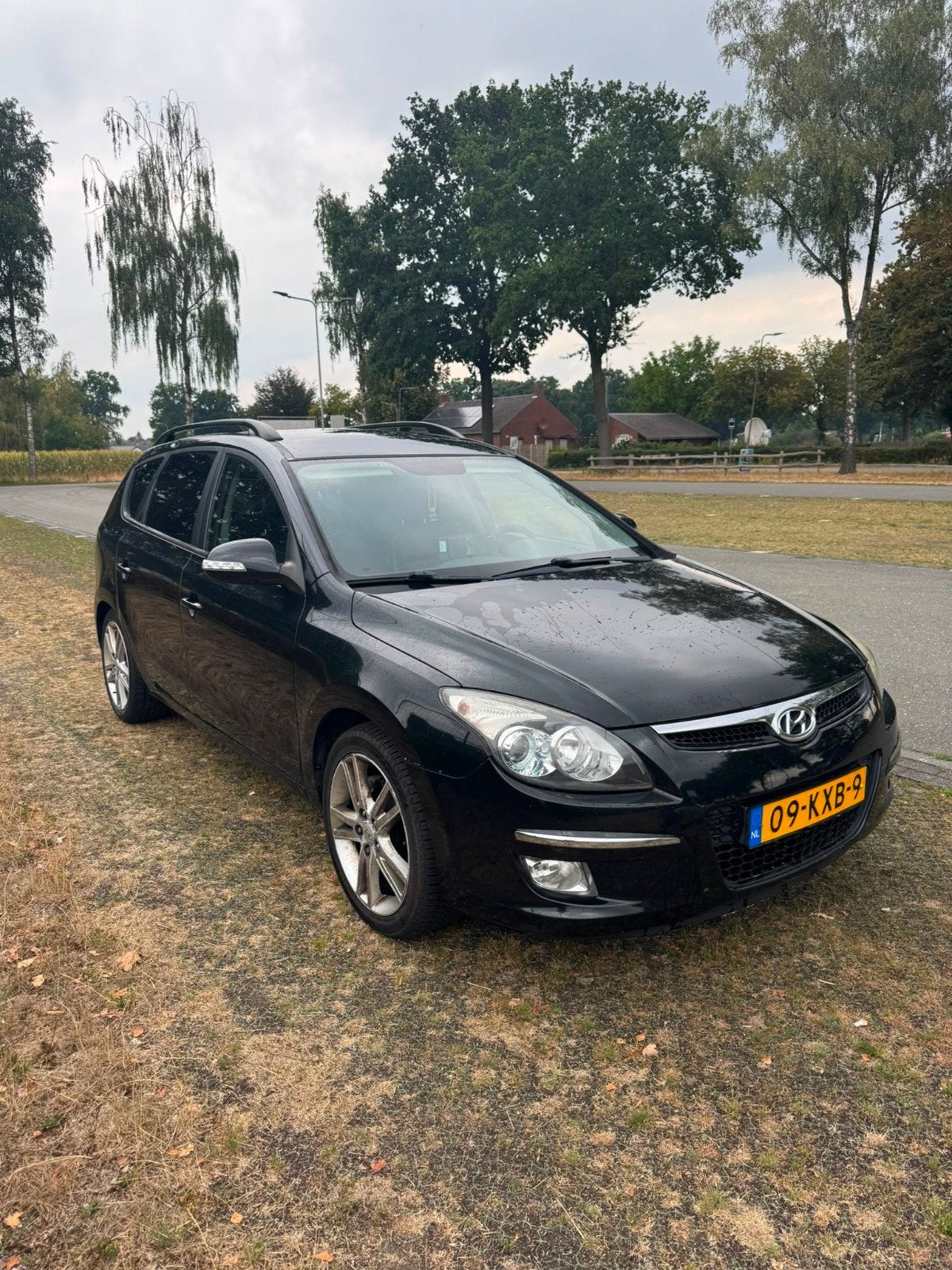 Hyundai i30 cw automaat Lederen bekleding, Auto's, Hyundai, 4 cilinders, Navigatiesysteem, Zwart, I30