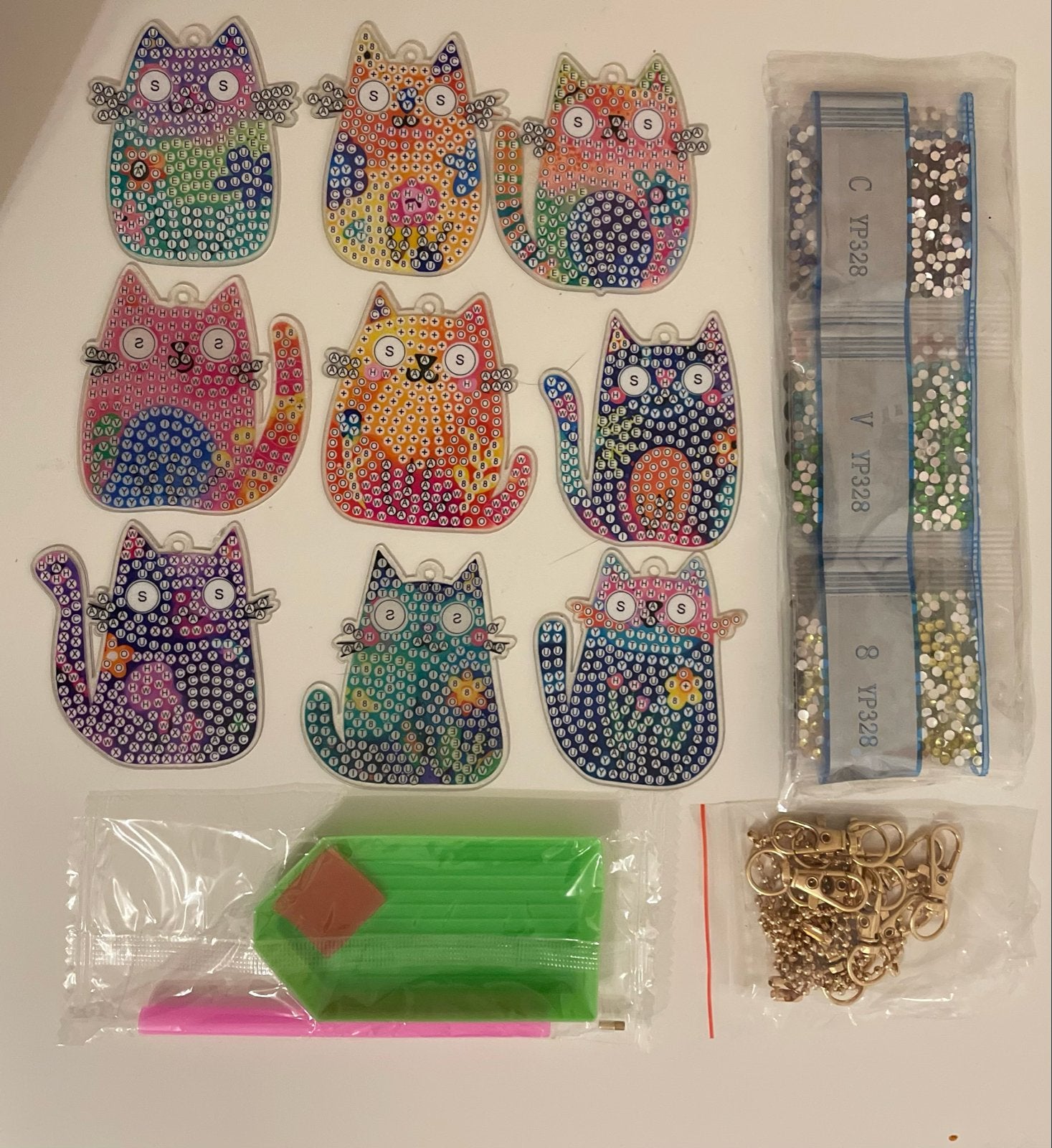 Diamond Painting 9 stuks Katten Sleutelhangers rond Nieuw, Nieuw, Meerkleurig, Ophalen of Verzenden, Kunststof