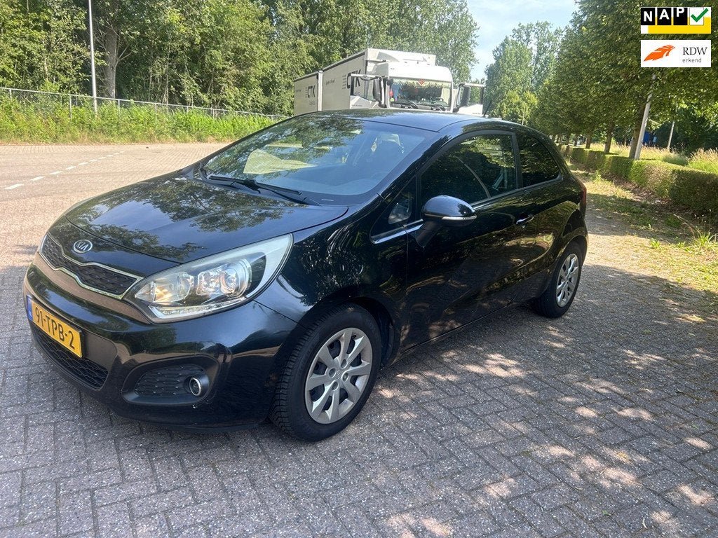 Kia Rio 1.2 CVVT Super Pack 2012! LED! CLIMATRONIC! KEYLESS!, Auto's, Euro 5, Zwart, 4 cilinders, Zwart