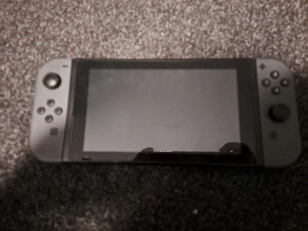 Nintendo switch grijs, Spelcomputers en Games, Spelcomputers | Nintendo Switch, Ophalen of Verzenden, Zo goed als nieuw, Met 2 controllers