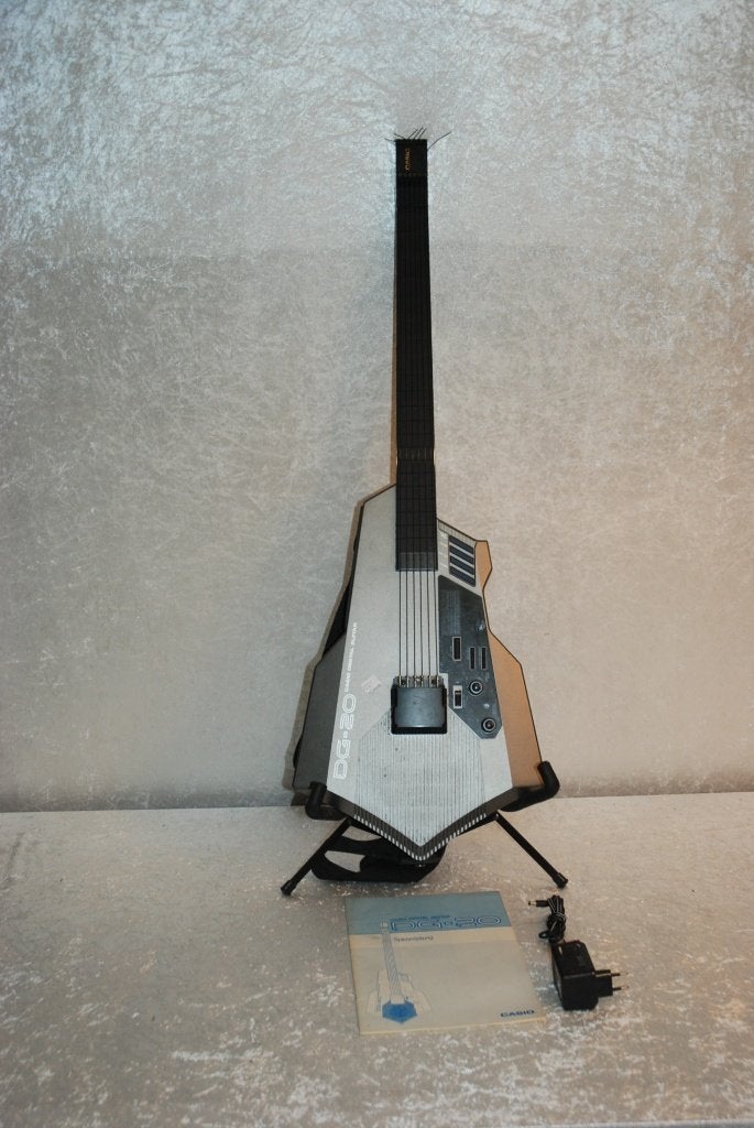 Casio DG20 digitale gitaar met manual en adapter  <26260929>, Gebruikt, ., Elektrische gitaar, .