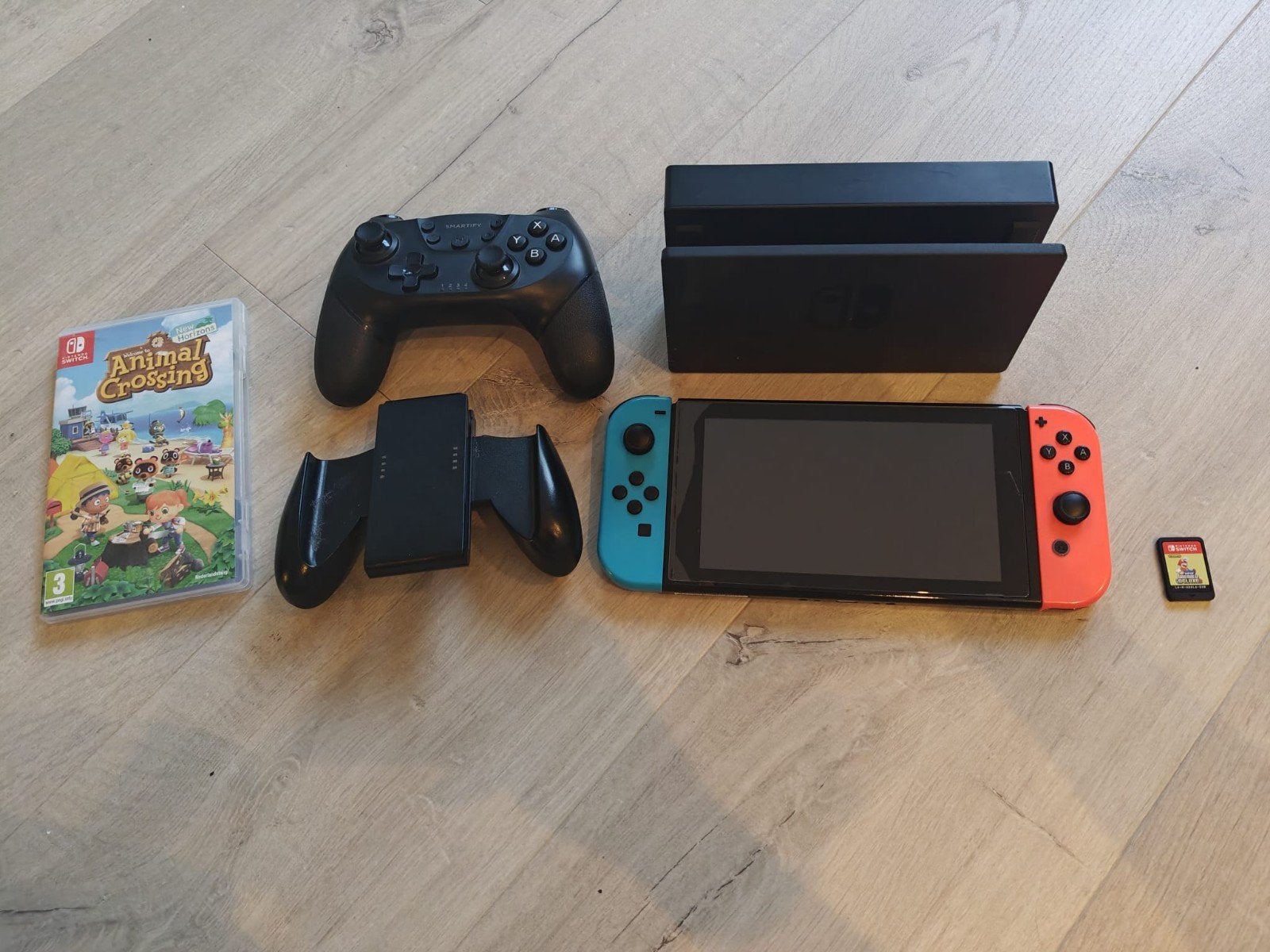 Nintendo Switch met extra controller en games, Met 2 controllers, Ophalen of Verzenden, Switch Original, Gebruikt