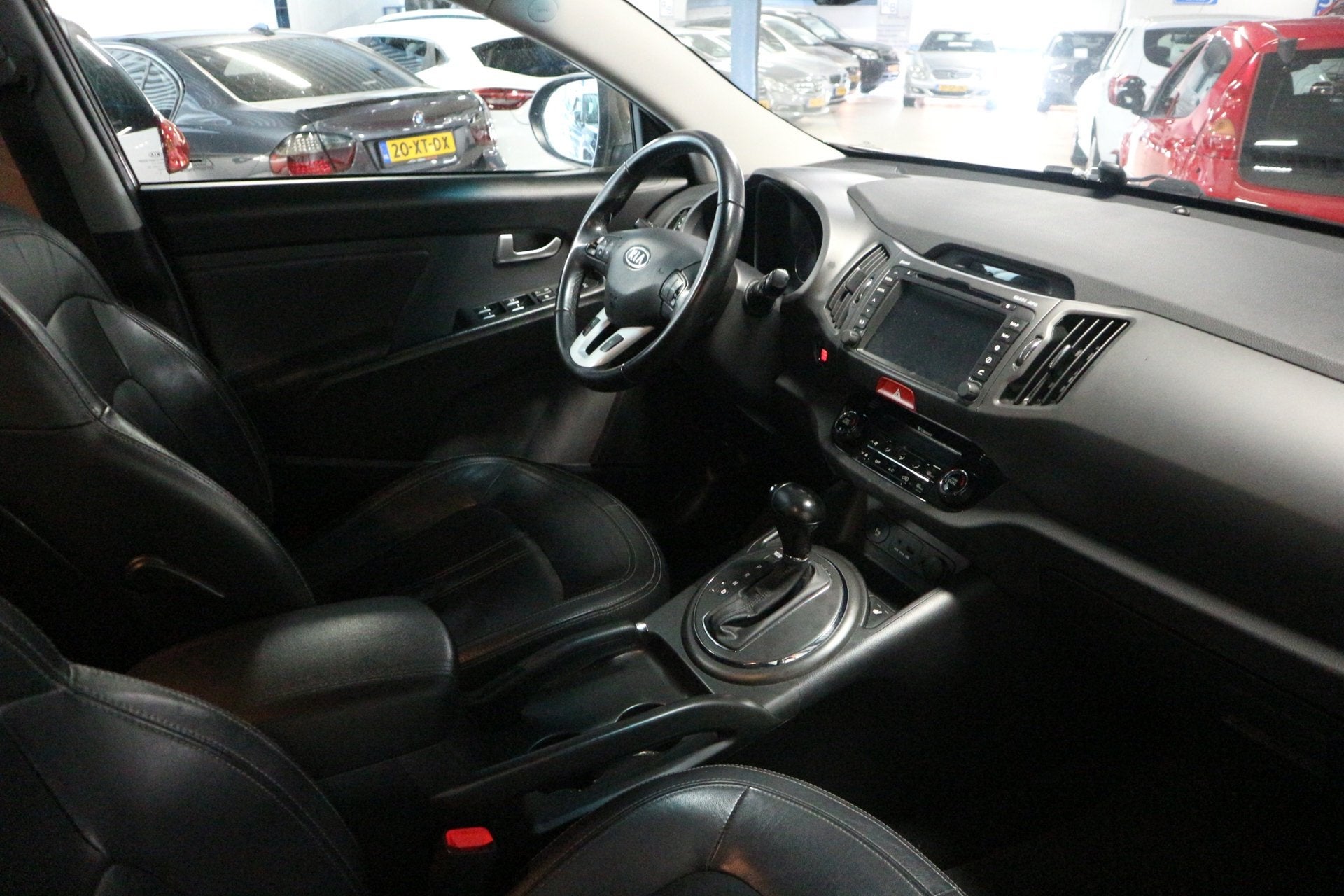 Kia Sportage 2.0 X-clusive / AUTOMAAT / LEER / NAV ! ! !, Gebruikt, 4 cilinders, Bruin, 163 pk