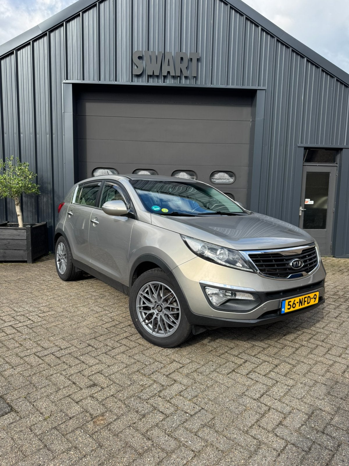Kia Sportage 2.0 Cvvt 2WD cruis/ trekhaak / airco, Beige, Leder en Stof, 163 pk, Handgeschakeld