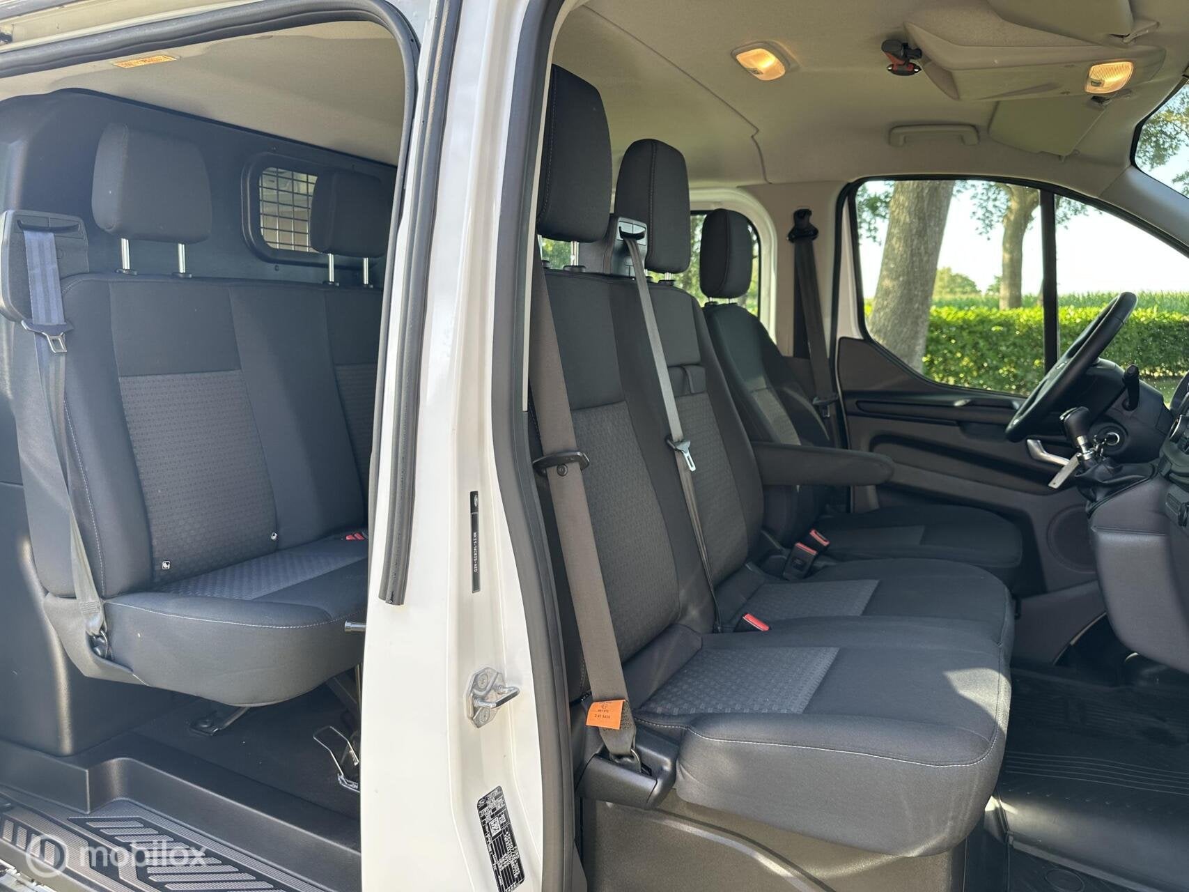 Ford Transit Custom 300 2.0 TDCI L2H1 Trend DC 6-Zits 1e eig, Voorwielaandrijving, Stof, 4 cilinders, 2540 kg