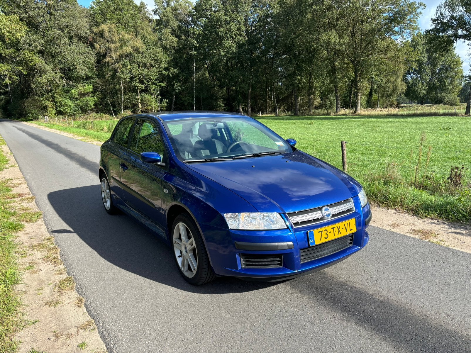Fiat Stilo 1.6 16V | 2007 | 150.329 km | Uitzonderlijk net, Auto's, Voorwielaandrijving, Zwart, Blauw, Origineel Nederlands