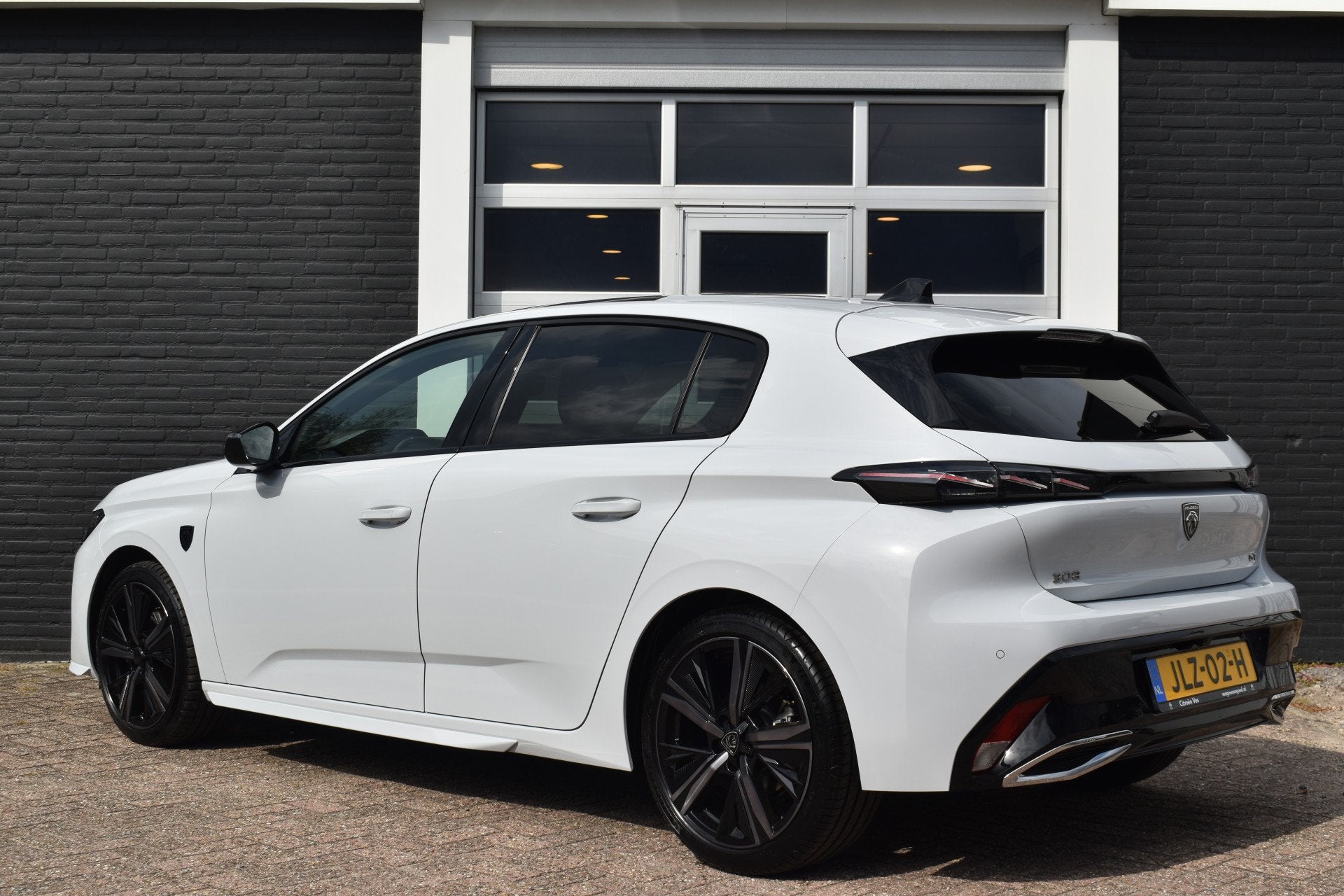 Peugeot 308 Hybrid 145 e-DCS6 Automaat GT | Navigatiesysteem, Gebruikt, Leder en Stof, Wit, Origineel Nederlands