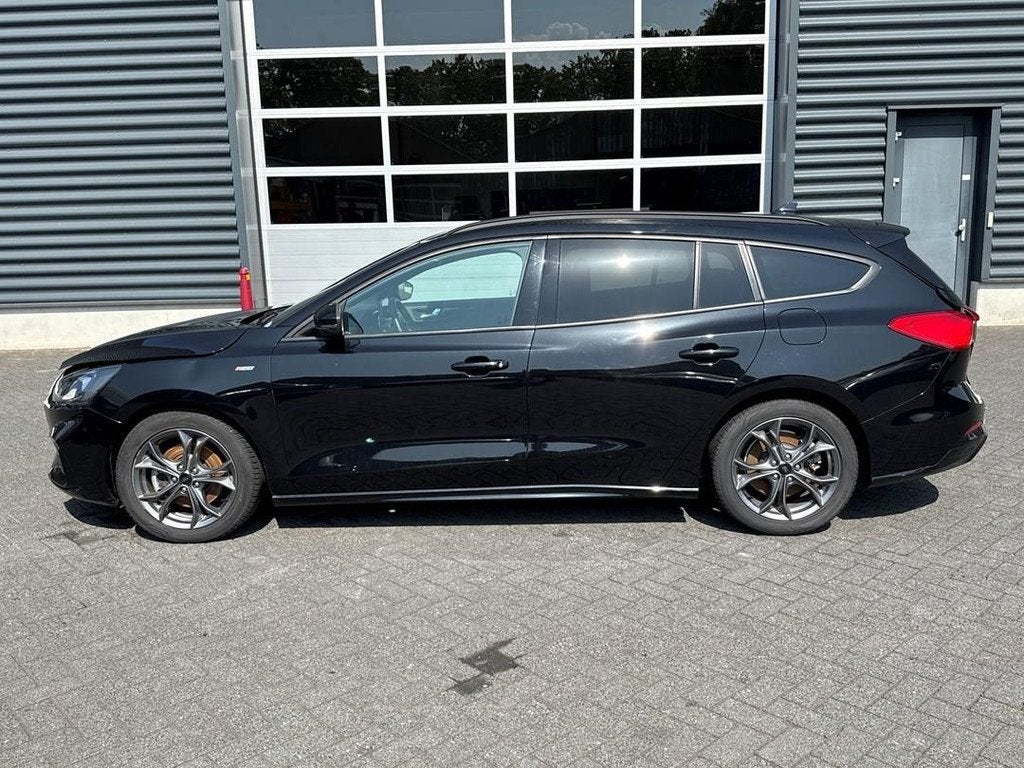 Ford Focus Wagon 1.0 EcoBoost Hybrid ST Line Business, Auto's, 125 pk, Euro 6, Lichtsensor, Zwart
