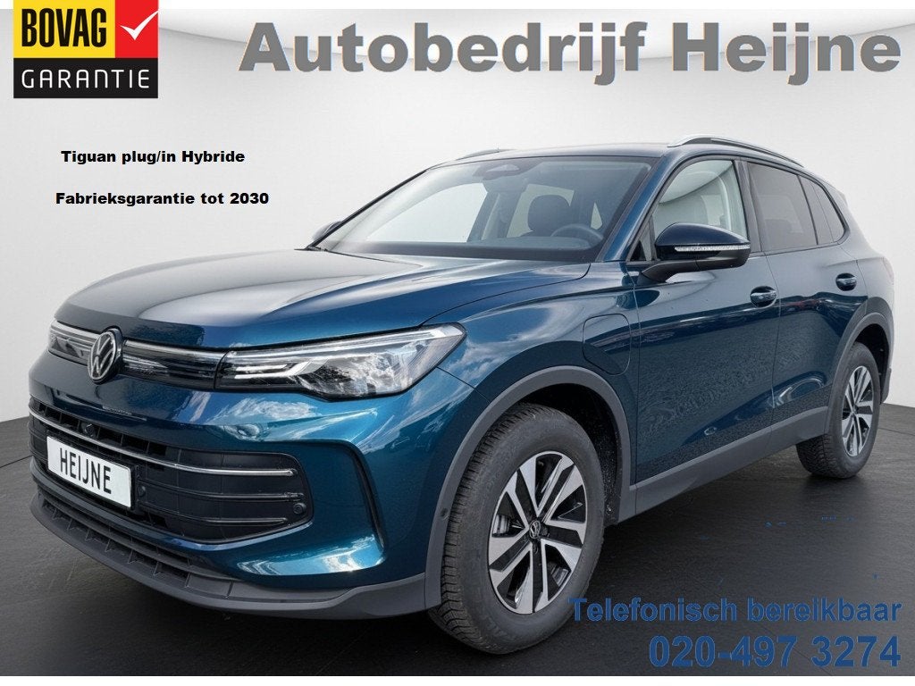 Volkswagen Tiguan 1.5 TSI 204PK DSG HYBRID LIFE ENERGY 360°, Auto's, Dealer onderhouden, Blauw, Bedrijf, 71 km/l