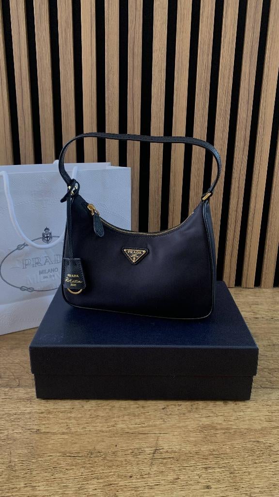 Originele Prada ReEdition 2005 Mini te koop, Sieraden, Tassen en Uiterlijk, Tassen | Damestassen, Ophalen, Zo goed als nieuw, Zwart