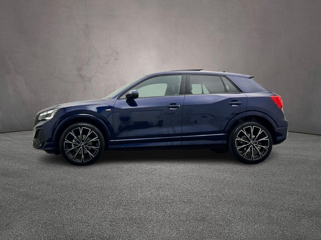 Audi Q2 35 TFSI 150PK S Edition | Panoramadak | Achteruitrij, Auto's, Audi, 4 cilinders, 150 pk, Blauw, Leder en Stof