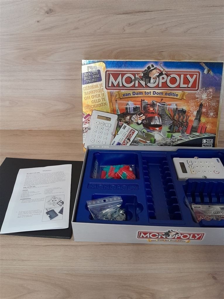 Monopoly van Dam tot Dom editie - s3723, Hobby en Vrije tijd, Gezelschapsspellen | Bordspellen, Verzenden, Zo goed als nieuw