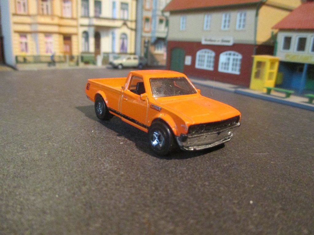Datsun 620 Pick Up - Hotwheels oranje, Ophalen of Verzenden, Gebruikt, Auto