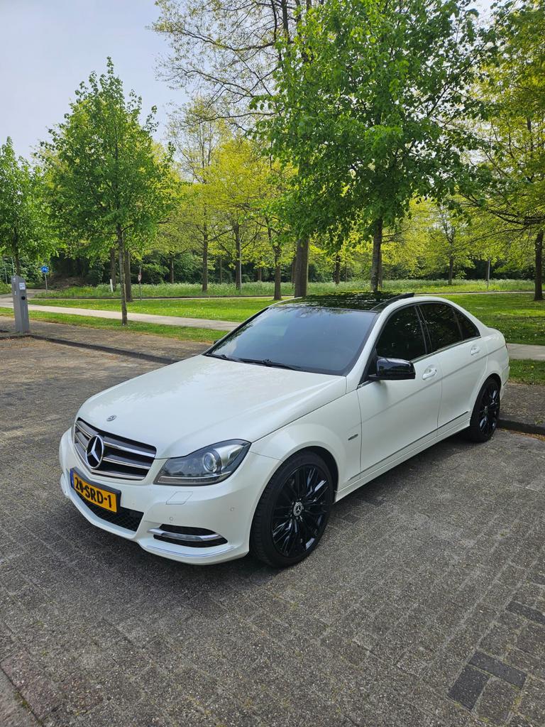 Mercedes-Benz C-Klasse 1.8 C200 Kompressor Sedan AUT 2011, Auto's, 1800 kg, 4 cilinders, Wit, Origineel Nederlands