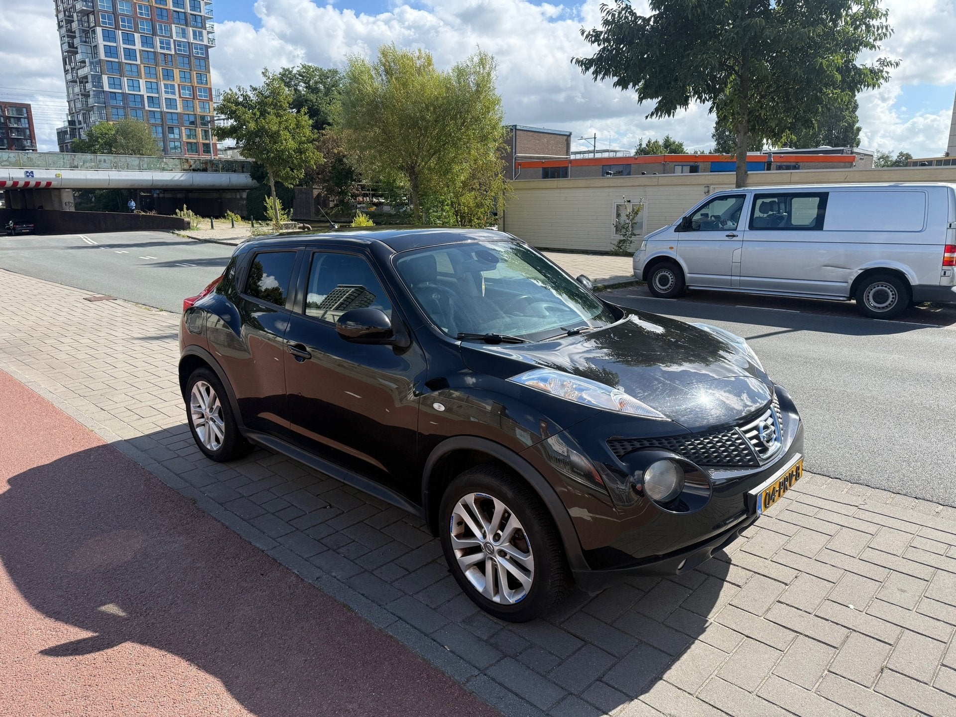 Nissan Juke 1.6 Tekna Clima Keyless Cruise Bluetooth NL Auto, Voorwielaandrijving, Euro 5, Zwart, 4 cilinders