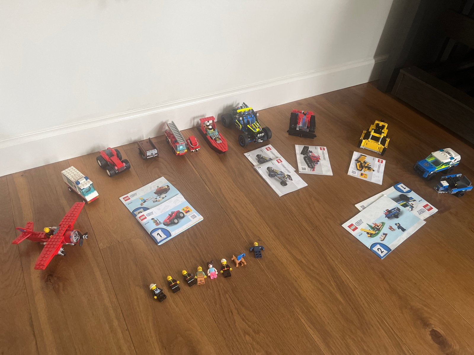 Grote collectie LEGO voertuigen en figuren met boekjes, Ophalen of Verzenden, Gebruikt, Overige merken