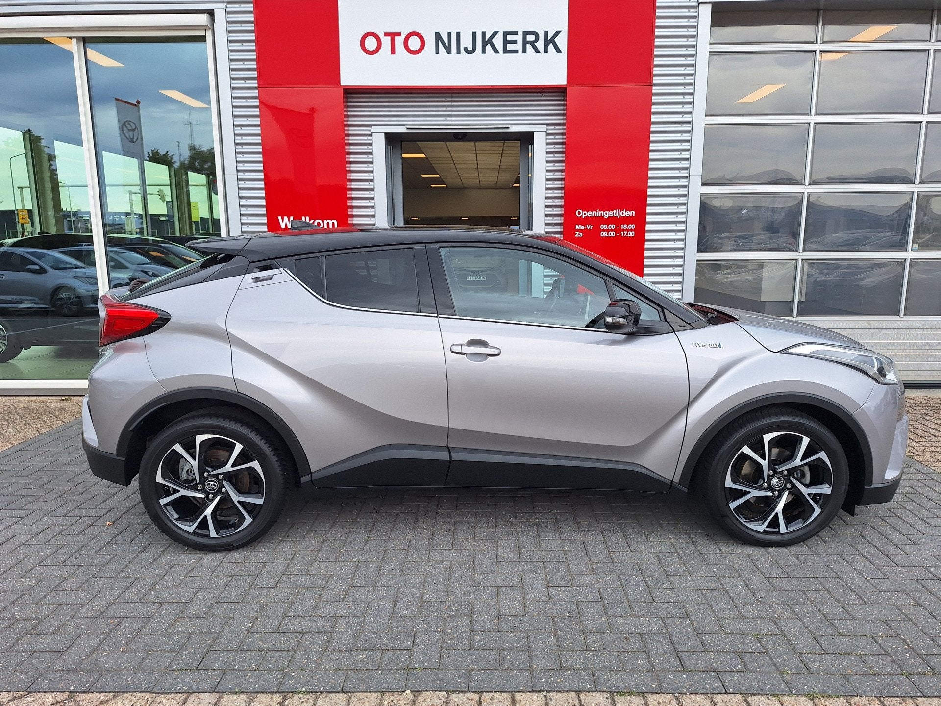 Toyota C-HR 1.8 Hybrid Bi-Tone (bj 2019, automaat), Auto's, 12 maanden, Stof, Euro 6, 4 cilinders