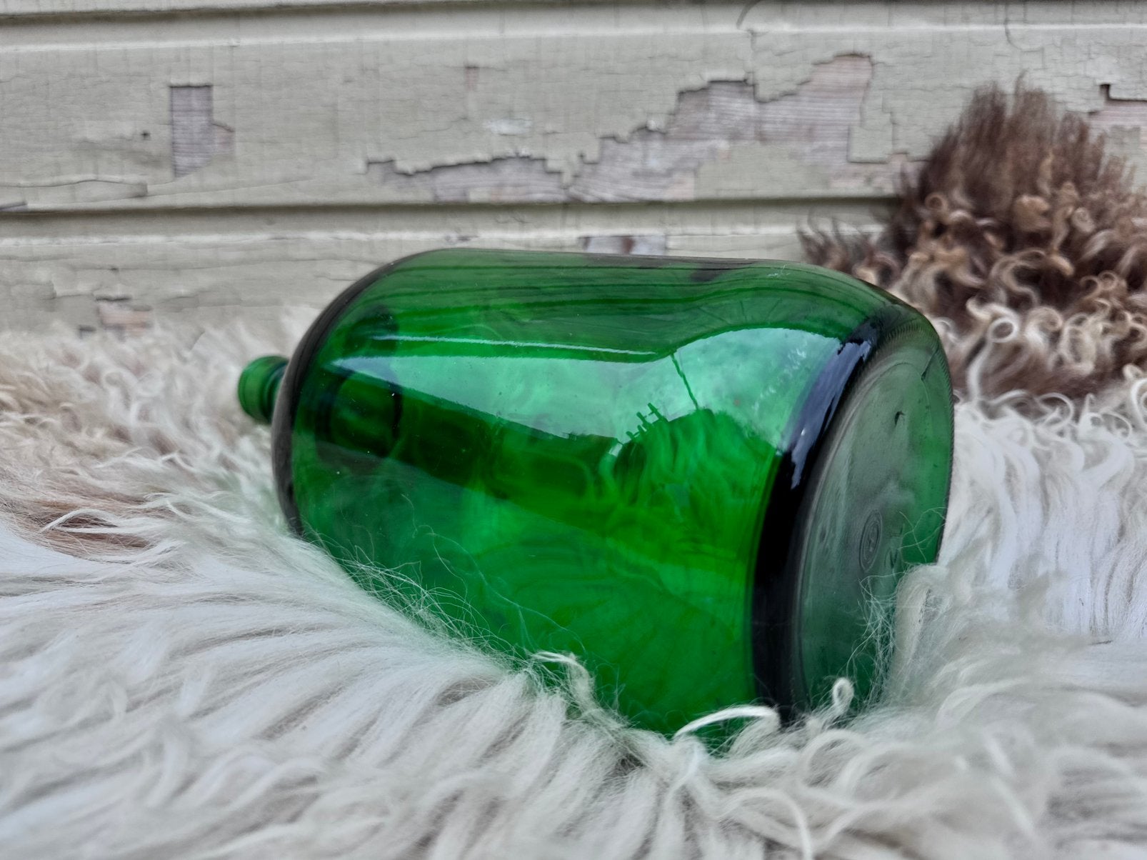Groene glazen fles glaswerk, Ophalen