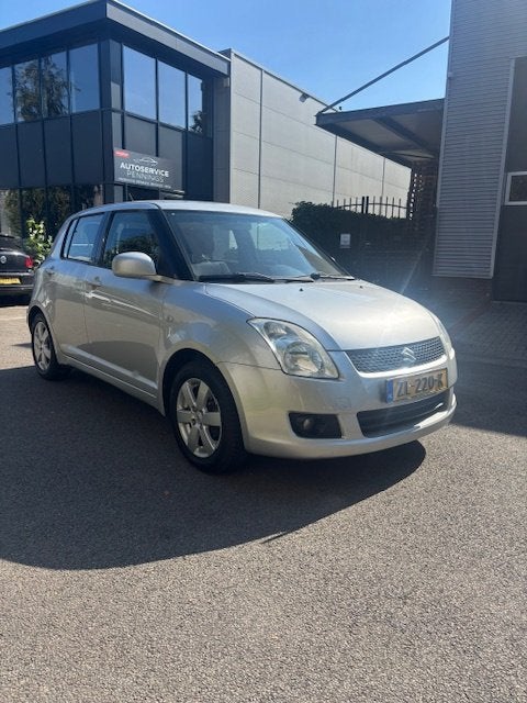 Suzuki Swift 1.3 5DRS 2009 Grijs nwe koppeling en versnl bak, Voorwielaandrijving, Stof, 40 €/maand, Zwart
