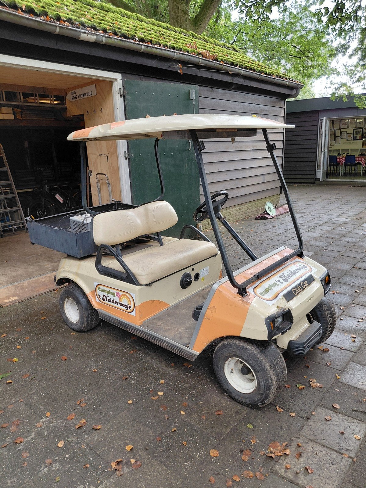 Club Car golfkar met oplader, Ophalen