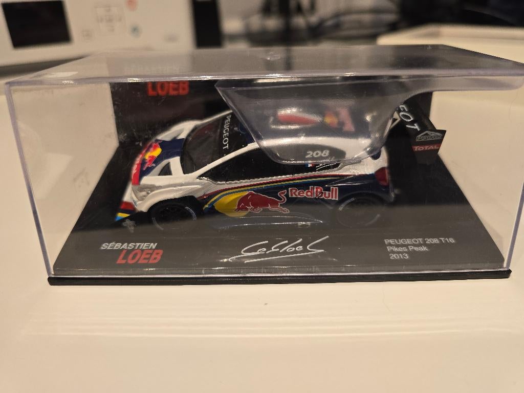 Peugeot 208 T16 Pikes Peak 2013, Hobby en Vrije tijd, Modelauto's | 1:43, Ophalen of Verzenden, Nieuw, Auto, Overige merken