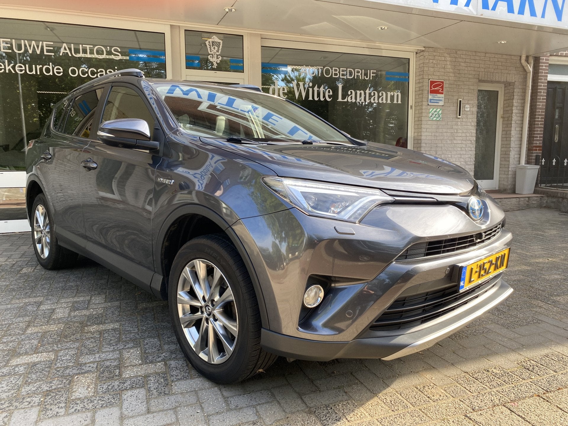 Toyota RAV4 2.5 Hybrid AWD Executive Navi Fullmap/Achteruitr, Auto's, Toyota, Automaat, Gebruikt, 1650 kg, Leder