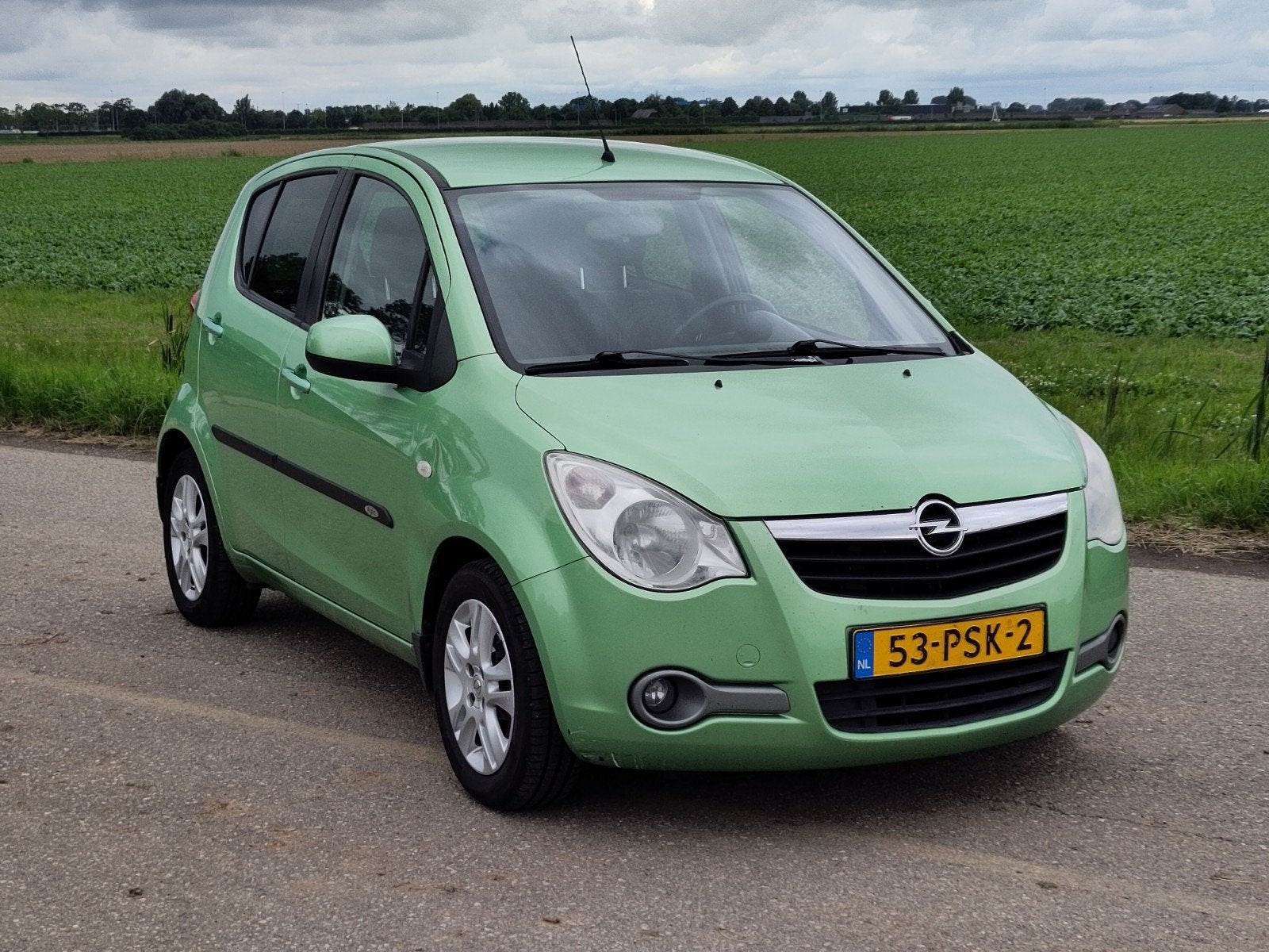Opel Agila 1.2 16V 69KW 2011 Groen, Auto's, Opel, Voorwielaandrijving, Stof, 40 €/maand, 4 cilinders