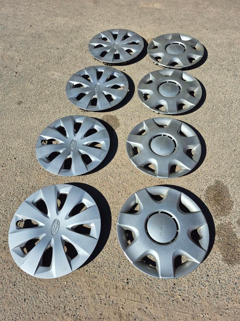 Set 14 inch en 15 inch Subaru wieldoppen, Auto diversen, Wieldoppen, Ophalen of Verzenden, Gebruikt