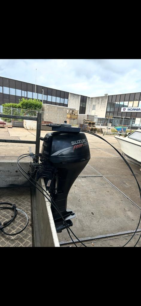 Suzuki Four Stroke Buitenboordmotor met stuur console, Gebruikt, Met afstandsbediening, Ophalen of Verzenden, 30 pk of meer
