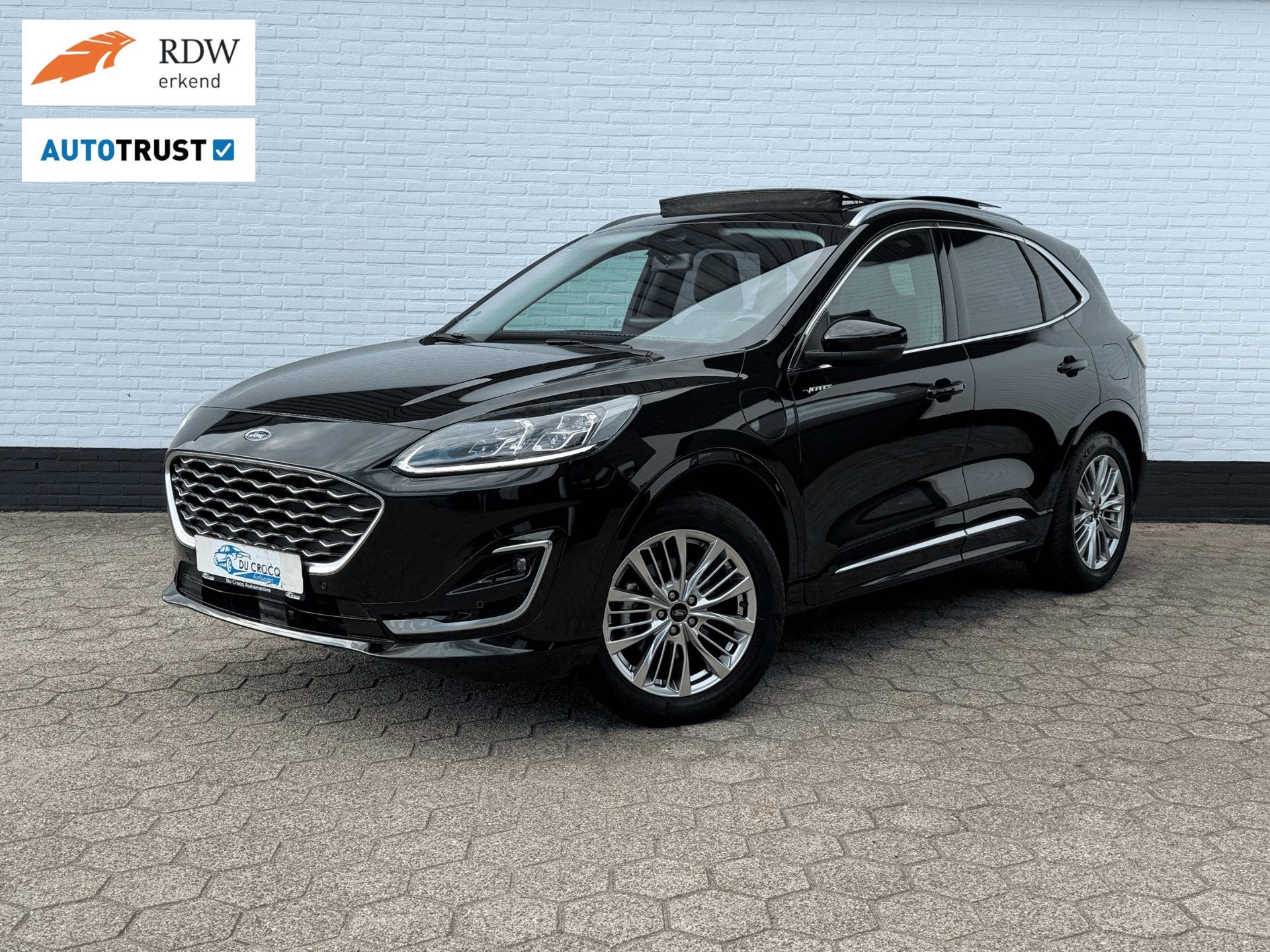 Ford Kuga 2.5 PHEV Vignale PANODAK l TREKHAAK l LEDER l B&O, Auto's, Gebruikt, Zwart, 4 cilinders, Zwart