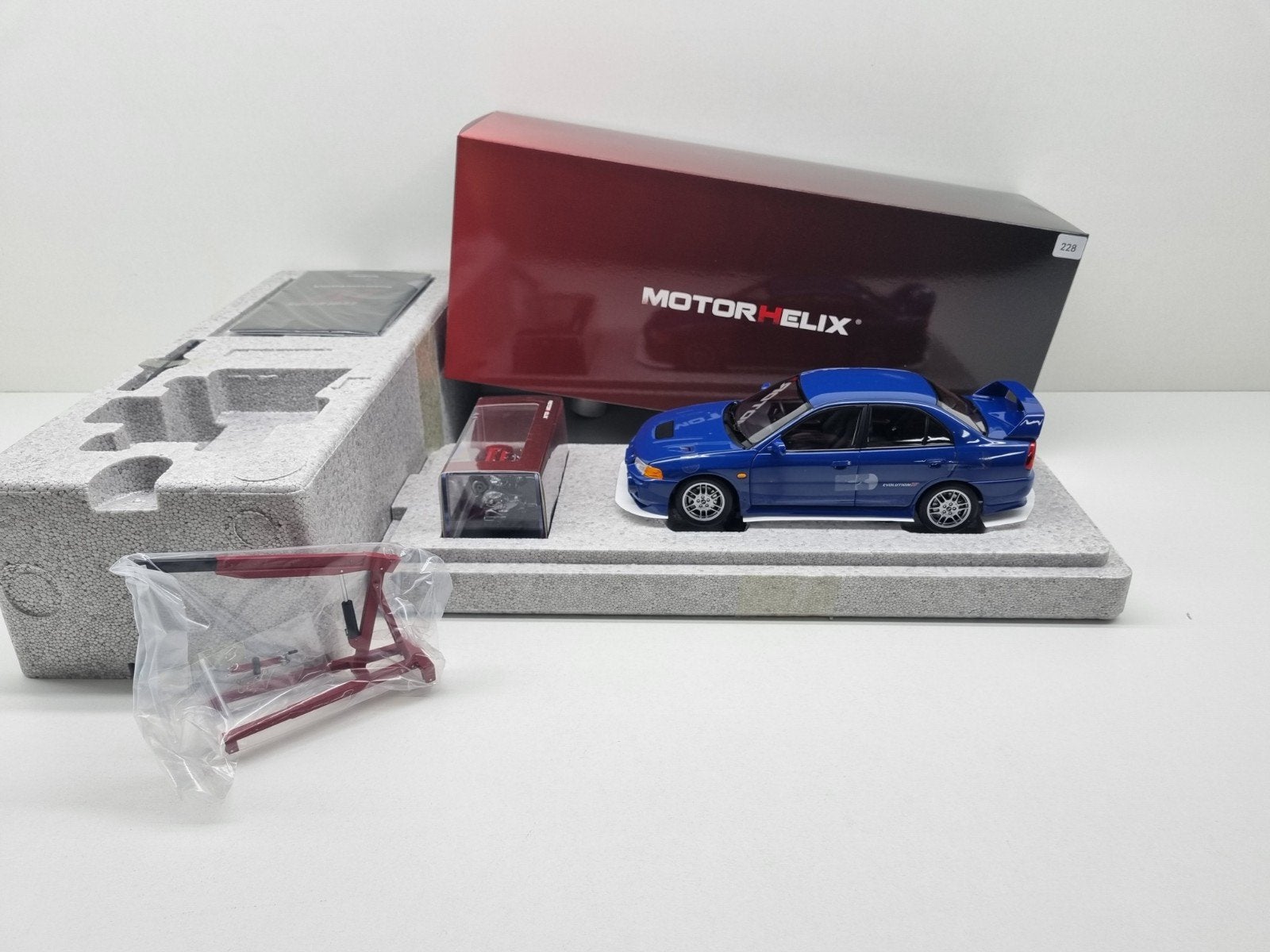 Motorhelix Mitsubishi Lancer Evolution IV 1:18 Nieuw, Ophalen of Verzenden, Nieuw, Auto