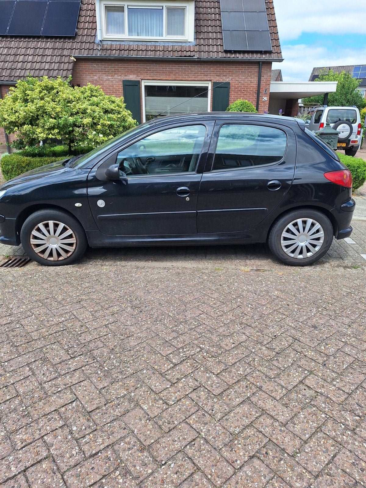 Peugeot 206 1.4 5D 2008 Zwart, Auto's, Peugeot, Voorwielaandrijving, 31 €/maand, 4 cilinders, Zwart