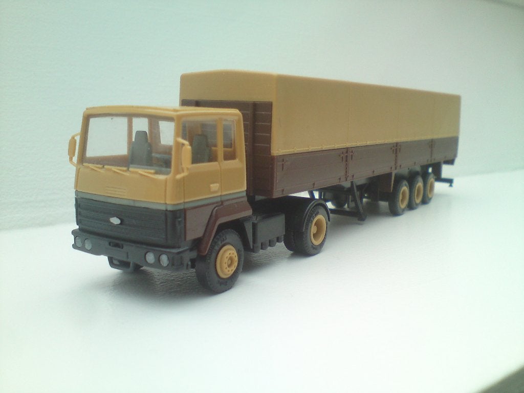 Herpa Ford Transcontinental huiftrailer bruin beige, Ophalen of Verzenden, Zo goed als nieuw, Bus of Vrachtwagen, Herpa