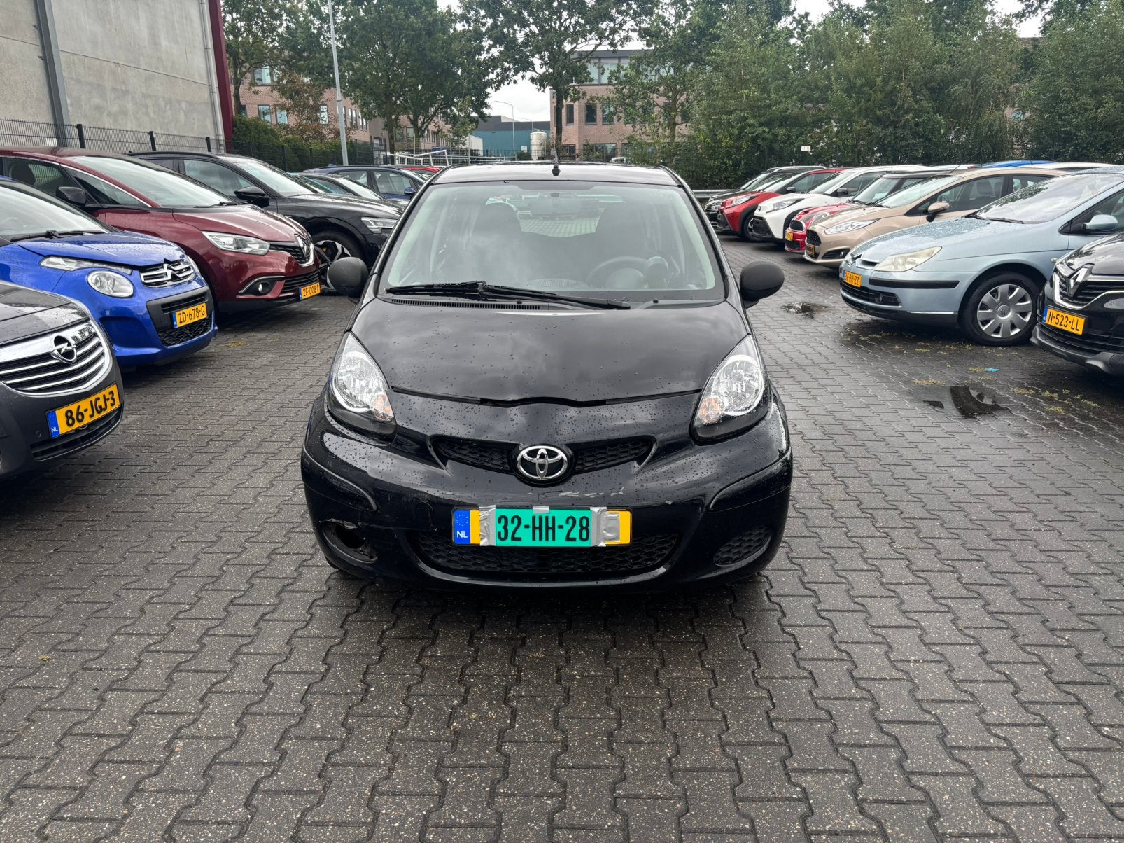 Toyota Aygo 1.0 12V Vvt-i 5DRS 2011 NAP, Auto's, Toyota, Voorwielaandrijving, Stof, Zwart, 4 stoelen