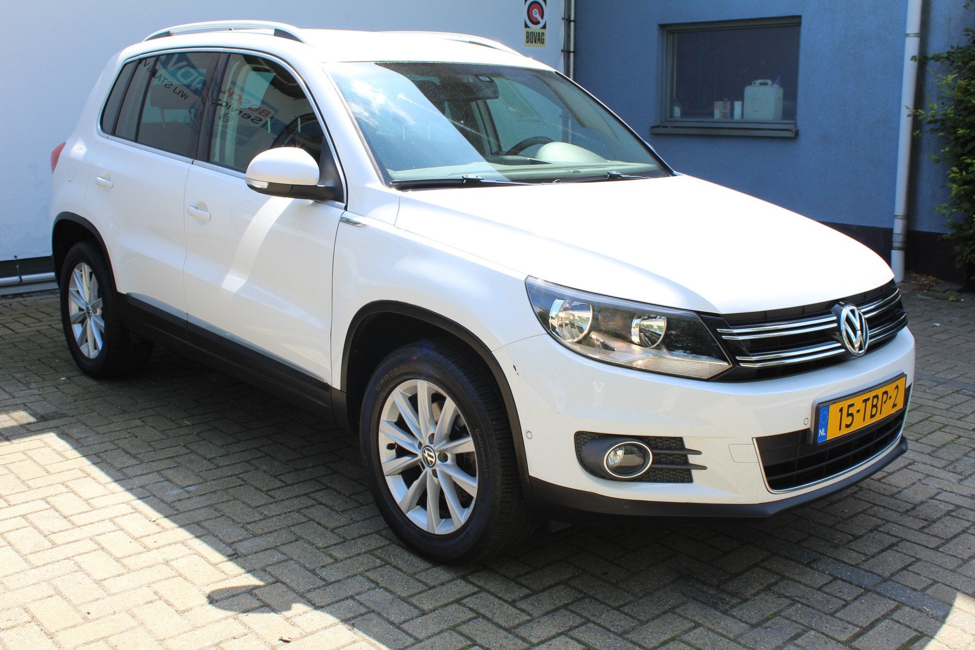 Volkswagen Tiguan 1.4 TSI Sport&Style | Incl. 12 maanden Gar, Voorwielaandrijving, Euro 5, Zwart, 4 cilinders