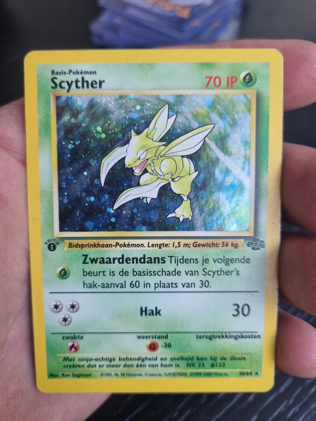 Scyther 10/64 jungle NL 1e editie , holo rare * € 45, Ophalen of Verzenden, Zo goed als nieuw, Losse kaart, Foil
