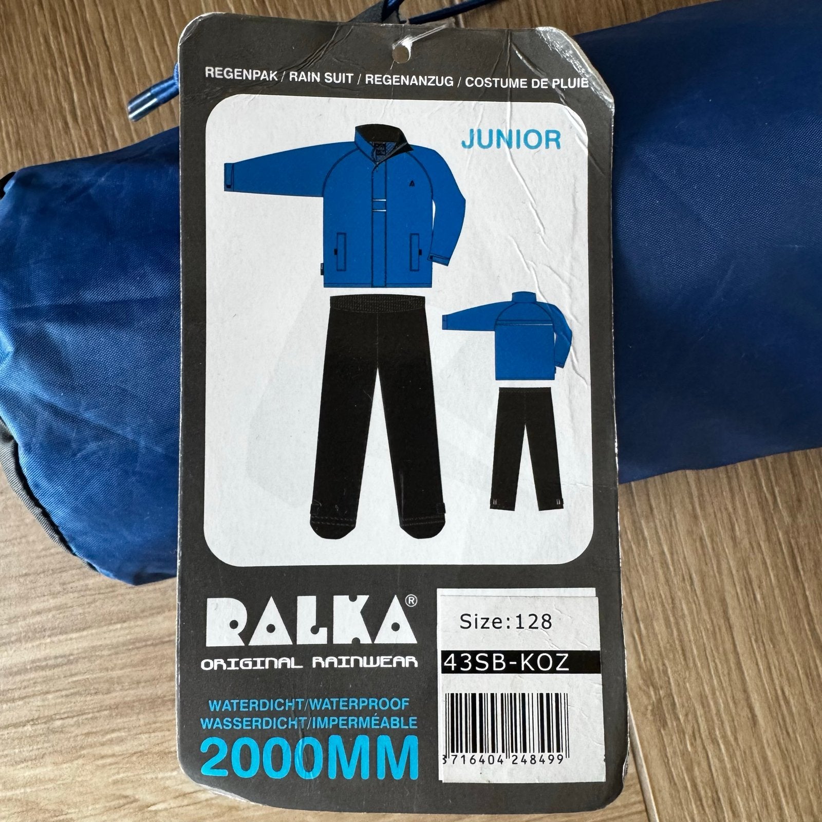 Ralka Regenpak Junior - Maat 128 - jongen - meisje, Kinderen en Baby's, Ophalen of Verzenden, Nieuw, Jongen of Meisje