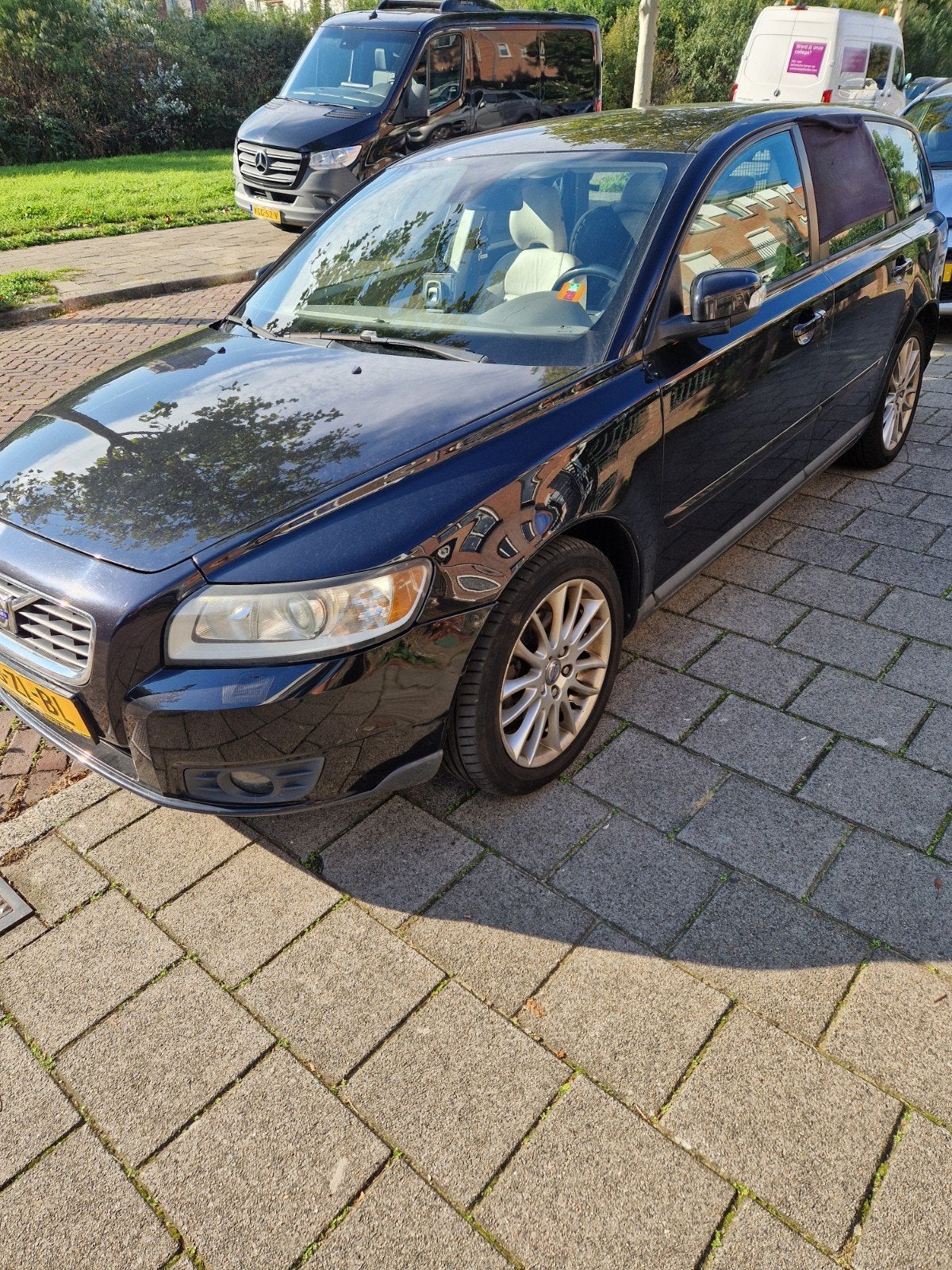 Volvo V50 1.8 2008 Zwart, Auto's, Voorwielaandrijving, 125 pk, Beige, 4 cilinders
