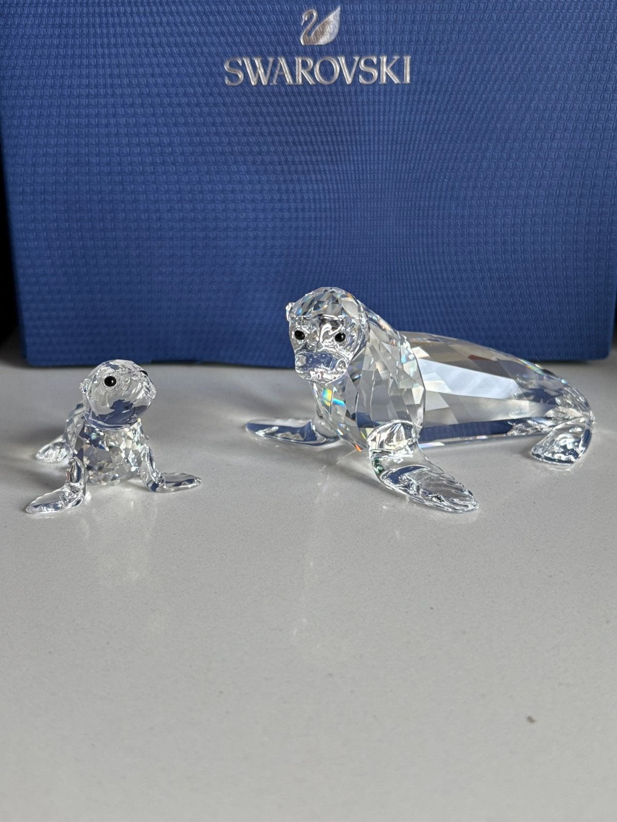 Swarovski zeeleeuw moeder met jong, Ophalen of Verzenden, Zo goed als nieuw, Figuurtje